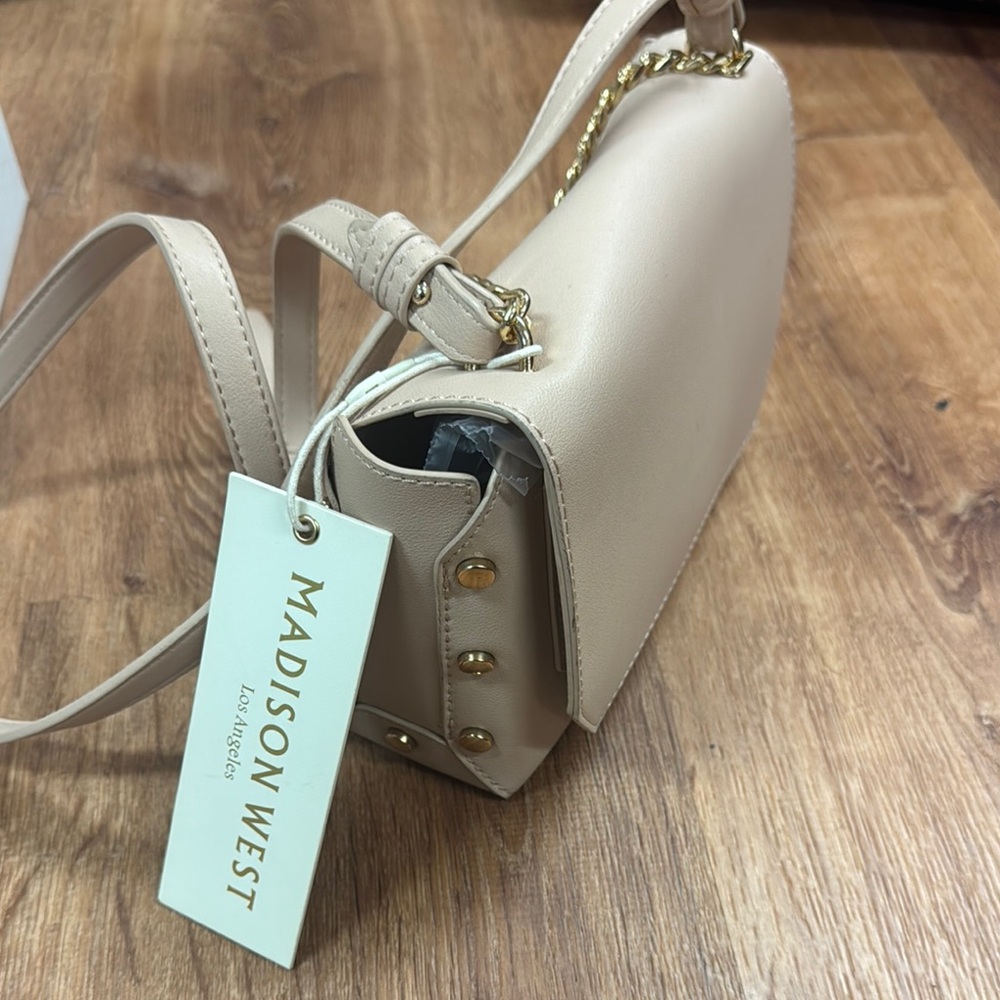 Madison West Cream Crossbody Bag with Minimalist Design
